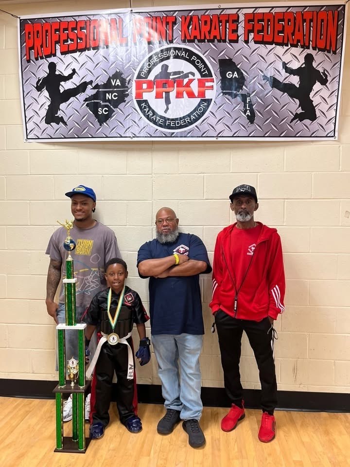 Members of the Alpha & Omega karate community at a tournament